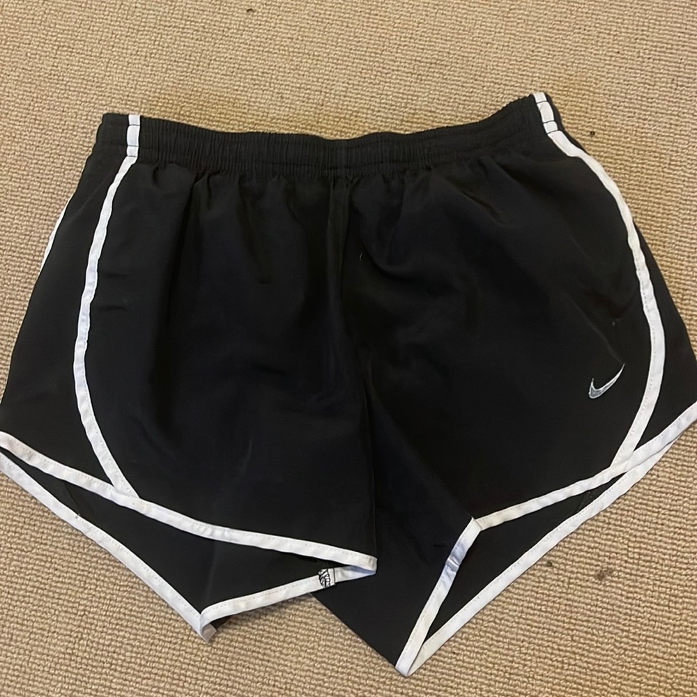 Nike kids size medium athletic classic black with white stripes nike shorts